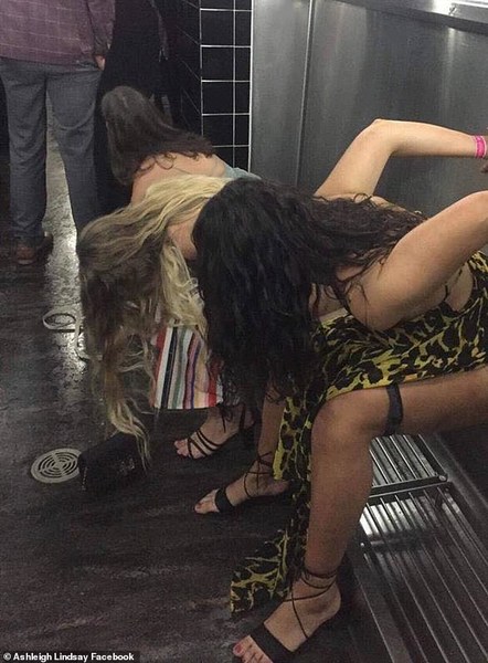 Despite their purses on the germ-infested bathroom floor alongside bottles of champagne and their plastic glasses, they saw absolutely no error their ways