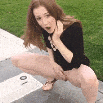 Girl peeing outside