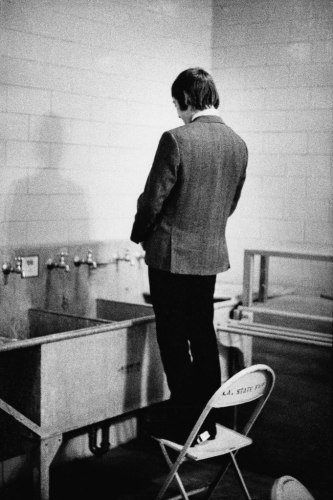 Just-Charlie-pissing-in-a-sink-at-the-LA-Memorial-Sports-Arena-December-1965-.jpg